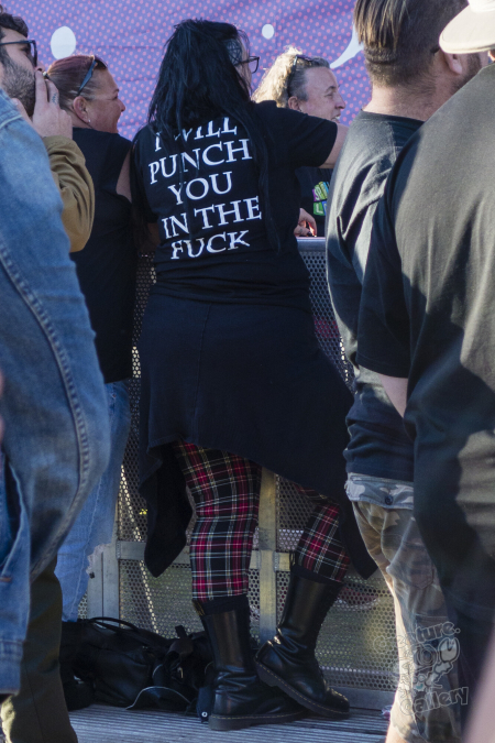 An alternative person in an otherwise friendly crowd