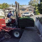 20210713 002410517 backyard progress forklift delivery grass