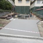 backyard progress tores driveway pour