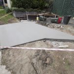 backyard progress tores driveway pour